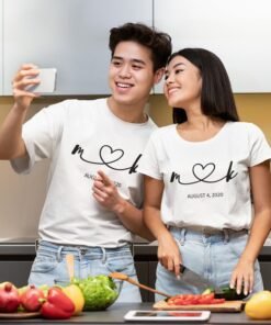 Matching couple T-shirts with connected initials and date