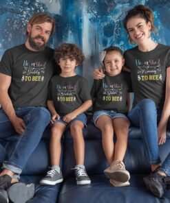 Family wearing He or She baby shower matching T-shirts